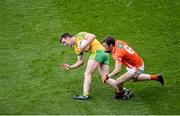 9 August 2014; Leo McLoone, Donegal, in action against Brendan Donaghy, Armagh. GAA Football All-Ireland Senior Championship, Quarter-Final, Donegal v Armagh, Croke Park, Dublin. Picture credit: Dáire Brennan / SPORTSFILE