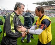 9 August 2014; Donegal manager Jim McGuinness with Armagh selector Kieran McGeeney after the game. GAA Football All-Ireland Senior Championship, Quarter-Final, Donegal v Armagh, Croke Park, Dublin. Picture credit: Stephen McCarthy / SPORTSFILE