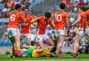 9 August 2014; Players from both sides including Leo McLoone, Donegal, and Aaron Findon, Armagh, during a first half altercation. GAA Football All-Ireland Senior Championship, Quarter-Final, Donegal v Armagh, Croke Park, Dublin. Picture credit: Ray McManus / SPORTSFILE