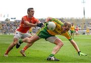 9 August 2014; Anthony Thompson, Donegal, in action against Mark Shields, Armagh. GAA Football All-Ireland Senior Championship, Quarter-Final, Donegal v Armagh, Croke Park, Dublin. Photo by Sportsfile