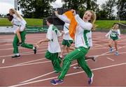 9 August 2014; Grace Lawler, Ireland, jumps with joy as she and her teammates run a victory lap after winning the 2014 Celtic Games. Morton Stadium, Santry, Co. Dublin. Picture credit: Cody Glenn / SPORTSFILE