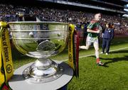 17 September 2006; Mayo captain David Heaney runs past the Sam Maguire while making his way onto the pitch before the game. Bank of Ireland All-Ireland Senior Football Championship Final, Kerry v Mayo, Croke Park, Dublin.  Picture credit: Brendan Moran / SPORTSFILE