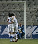 7 October 2006; Konstantiuus Charalampidis, Cyprus, celebrates his side's fourth goal with team-mate Konstantinos Makridis, 20, as a dejected Republic of Ireland goalkeeper Paddy Kenny looks on. Euro 2008 Championship Qualifier, Cyprus v Republic of Ireland, GSP Stadium, Nicosia, Cyprus. Picture credit: David Maher / SPORTSFILE