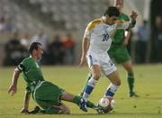 7 October 2006; Konstantinos Makridis, Cyprus, is tackled by the Republic of Ireland's Stephen Ireland. Euro 2008 Championship Qualifier, Cyprus v Republic of Ireland, GSP Stadium, Nicosia, Cyprus. Picture credit: David Maher / SPORTSFILE
