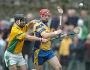 8 October 2006; Joe Canning, Portumna, is tackled by Charlie Donnellan, Craughwell. Galway Senior Hurling Championship Semi-Final, Craughwell v Portumna, Athenry, Galway. Picture credit: Ray Ryan / SPORTSFILE