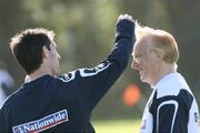 9 October 2006; Keith Gillespie has an interest in the hair style of kitman Derek McKinley during Northern Ireland squad training. Newforge Country Club, Belfast, Co. Antrim. Picture credit: Oliver McVeigh / SPORTSFILE