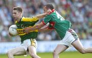 17 September 2006; Marc O'Se, Kerry, in action against Trevor Mortimer, Mayo. Bank of Ireland All-Ireland Senior Football Championship Final, Kerry v Mayo, Croke Park, Dublin.  Picture credit: Ray McManus / SPORTSFILE