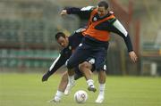 10 October 2006; John O'Shea, in action his team-mate Andy Reid, during Republic of Ireland squad training. Lansdowne Road, Dublin. Picture credit: David Maher / SPORTSFILE