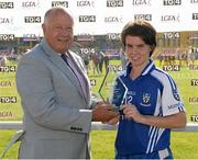 9 August 2014; Cora Courtney, Monaghan, is presented with the Player of the Match by Pat Quill, President, Ladies Gaelic Football Association. TG4 All-Ireland Ladies Football Senior Championship, Round 2 Qualifier, Monaghan v Tyrone, Pearse Park, Longford. Picture credit: Oliver McVeigh / SPORTSFILE
