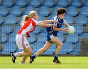 9 August 2014; Cora Courtney, Monaghan, in action against Neamh Woods, Tyrone. TG4 All-Ireland Ladies Football Senior Championship, Round 2 Qualifier, Monaghan v Tyrone, Pearse Park, Longford. Picture credit: Oliver McVeigh / SPORTSFILE