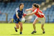 9 August 2014; Terese Scoyy, Monaghan, in action against Laura McGillion, Tyrone. TG4 All-Ireland Ladies Football Senior Championship, Round 2 Qualifier, Monaghan v Tyrone, Pearse Park, Longford. Picture credit: Oliver McVeigh / SPORTSFILE