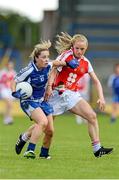 9 August 2014; Ciara McAnespie, Monaghan, in action against Neamh Woods, Tyrone. TG4 All-Ireland Ladies Football Senior Championship, Round 2 Qualifier, Monaghan v Tyrone, Pearse Park, Longford. Picture credit: Oliver McVeigh / SPORTSFILE