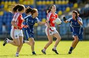 9 August 2014; Cathy Donnelly, Tyrone, in action against Grainne McNally and Christine Reilly, Monaghan. TG4 All-Ireland Ladies Football Senior Championship, Round 2 Qualifier, Monaghan v Tyrone, Pearse Park, Longford. Picture credit: Oliver McVeigh / SPORTSFILE