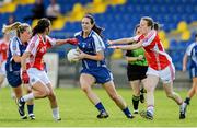 9 August 2014; Amanda Finnegan, Monaghan, in action against Angie McShane and Cathy Donnelly, Tyrone. TG4 All-Ireland Ladies Football Senior Championship, Round 2 Qualifier, Monaghan v Tyrone, Pearse Park, Longford. Picture credit: Oliver McVeigh / SPORTSFILE