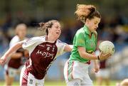 9 August 2014; Kathryn Sullivan, Mayo, in action against Maud Annie Foley, Westmeath. TG4 All-Ireland Ladies Football Senior Championship, Round 2 Qualifier, Mayo v Westmeath, Pearse Park, Longford. Picture credit: Oliver McVeigh / SPORTSFILE