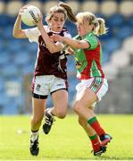 9 August 2014; Karen Hegarty, Westmeath, in action against Marie Corbett, Mayo. TG4 All-Ireland Ladies Football Senior Championship, Round 2 Qualifier, Mayo v Westmeath, Pearse Park, Longford. Picture credit: Oliver McVeigh / SPORTSFILE