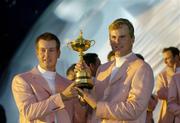 24 September 2006; Henrik Stenson, left, and Robert Karlsson, Team Europe 2006, with the Ryder Cup after they defeated the USA. 36th Ryder Cup Matches, K Club, Straffan, Co. Kildare, Ireland. Picture credit: Matt Browne / SPORTSFILE