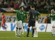 11 October 2006; Republic of Ireland players Andy Reid and Robbie Keane remonstrate with referee Bertrand Layec after the Czech Republic had scored their first goal. Euro 2008 Championship Qualifier, Republic of Ireland v Czech Republic, Lansdowne Road, Dublin. Picture credit: Matt Browne / SPORTSFILE
