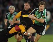 13 October 2006; Matt Mostyn, Connacht, is tackled by Ben Daly, Newport Gwent Dragons. Magners League, Connacht v Newport Gwent Dragons, Sportsground, Galway. Picture credit: Ray Ryan / SPORTSFILE