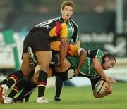 13 October 2006; Gavin Williams, Connacht, is tackled by Aled Brew and Gareth Cooper, Newport Gwent Dragons. Magners League, Connacht v Newport Gwent Dragons, Sportsground, Galway. Picture credit: Ray Ryan / SPORTSFILE