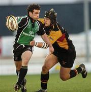 13 October 2006; Daniel Riordan, Connacht, is tackled by Jamie Corsi, Newport Gwent Dragons. Magners League, Connacht v Newport Gwent Dragons, Sportsground, Galway. Picture credit: Ray Ryan / SPORTSFILE