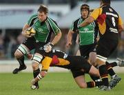 13 October 2006; Colm Rigney, Connacht, is tackled by Ben Daly, Newport Gwent Dragons. Magners League, Connacht v Newport Gwent Dragons, Sportsground, Galway. Picture credit: Ray Ryan / SPORTSFILE