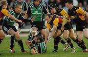 13 October 2006; Gavin Williams, Connacht, is tackled by Ceri Sweeney, Richard Fussell and Jamie Corsi, Newport Gwent Dragons. Magners League, Connacht v Newport Gwent Dragons, Sportsground, Galway. Picture credit: Ray Ryan / SPORTSFILE