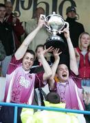 15 October 2006; Injured captain Michael McCambridge and playing captain Aidan Delargy, lift the cup for Ruairi Og Cushendall. Antrim Senior Hurling Championship Final, Ruairi Og Cushendall v Shamrocks Loughgiel, Casement Park, Belfast, Co. Antrim. Picture credit: Oliver McVeigh / SPORTSFILE