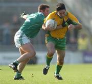15 October 2006; Kieran Comer, Corofin, in action against Kevin Gavin, Caltra. Galway Senior Football Championship Final, Caltra v Corofin, Pearse Stadium, Galway. Picture credit: Ray Ryan / SPORTSFILE
