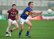 26 July 2014; John Coghlan, Tipperary, in action against Michael Martin, Galway. GAA Football All Ireland Senior Championship, Round 4A, Galway v Tipperary. O'Connor Park, Tullamore, Co. Offaly. Picture credit: Barry Cregg / SPORTSFILE