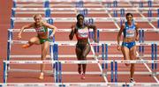 12 August 2014; Ireland's Sarah Lavin during her heat of the women's 100m hurdle event, where she finished 8th in a time of 13.35. Also pictured is eventual heat winner Anne Zagré of Belgium, centre, and eventual thrid place Marzia Caravelli of Italy, right. European Athletics Championships 2014 - Day 1. Letzigrund Stadium, Zurich, Switzerland. Picture credit: Stephen McCarthy / SPORTSFILE