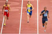 12 August 2014; Jimmy Vicaut of France, right, on his way to winning his heat of the men's 100m, with a time of 10.06. Also pictured are Ángel David Rodríguez of Spain, left, and Patrik Andersson of Sweden. European Athletics Championships 2014 - Day 1. Letzigrund Stadium, Zurich, Switzerland. Picture credit: Stephen McCarthy / SPORTSFILE