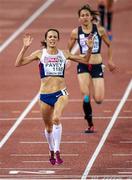 12 August 2014; Jo Pavey of Great Britain crosses the line to win the women's 10,000m event, with a time of 32:22.39. European Athletics Championships 2014 - Day 1. Letzigrund Stadium, Zurich, Switzerland. Picture credit: Stephen McCarthy / SPORTSFILE