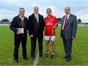 12 August 2014; Jockey Davy Russell, second from right, and trainer Jim Bolger, left, with Mark Mellett,  second from left, Head of Fundraising ICS, and John McCormack, CEO ICS, after the game. Ireland’s GAA and Horse Racing ‘All Stars’ got their hurleys out for cancer research on Tuesday night at Saint Conleth’s Park, Newbridge, Kildare for a celebrity hurling match in aid of the Irish Cancer Society to raise money for cancer research. The event, which was organised by horseracing legend Jim Bolger, along with champion jockey Davy Russell, saw a host of Irish hurling and horse racing stars come together for a fantastic game, which also boasted celebrity referees, lineswomen and umpires - who included DJ Carey, Katie and Ted Walsh, and Cyril Farrell - to name but a few. Irish Cancer Society's Hurling for Cancer Research 2014, Jim Bolger's Stars v Davy Russell's Best, St. Conleth’s Park, Newbridge, Co. Kildare. Irish Cancer Society's Hurling for Cancer Research 2014, Jim Bolger's Stars v Davy Russell's Best, St. Conleth’s Park, Newbridge, Co. Kildare. Picture credit: Barry Cregg / SPORTSFILE