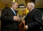 16 October 2006; President of the GAA Nickey Brennan in conversation with Finbarr McCarthy, author, at the launch of Great GAA Moments 2006. Great GAA Moments 2006 recalls the stories that made the headlines, reveals the drama behind the scenes and captures the colour and excitement of the big match days at both club and county level. Kilmacud Crokes GAA Club, Glenalbyn House, Stillorgan, Co Dublin. Picture credit: Pat Murphy / SPORTSFILE