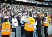 17 September 2006; Al Gallon, 2nd from right, and Frontline Security Staff stop the crowd from invading the pitch. Bank of Ireland All-Ireland Senior Football Championship Final, Kerry v Mayo, Croke Park, Dublin.  Picture credit: Damien Eagers / SPORTSFILE