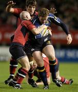 6 October 2006; Stephen Keogh, Leinster, is tackled by Peter Stringer and Donncha O'Callaghan, Munster. Magners League, Leinster v Munster, Lansdowne Road, Dublin. Picture credit: Brendan Moran / SPORTSFILE