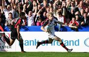 21 October 2006; Andrew Trimble, Ulster, races clear of Clement Poitrenaud, Toulouse, on his way to score the first try. Heineken Cup 2006-2007, Pool 5, Round 1, Ulster v Toulouse, Ravenhill Park, Belfast. Picture credit: Oliver McVeigh / SPORTSFILE