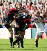 21 October 2006; Roger Wilson, Ulster, is tackled by Toulouse players theirry Dusatoir and Fabien Pelous. Heineken Cup 2006-2007, Pool 5, Round 1, Ulster v Toulouse, Ravenhill Park, Belfast. Picture credit: Oliver McVeigh / SPORTSFILE