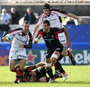 21 October 2006; Paddy Wallace, Ulster, supported by Justin Harrison, races clear of Florian Fritz, Toulouse. Heineken Cup 2006-2007, Pool 5, Round 1, Ulster v Toulouse, Ravenhill Park, Belfast. Picture credit: Oliver McVeigh / SPORTSFILE