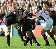 21 October 2006; Roger Wilson, Ulster, is tackled by Toulouse players theirry Dusatoir and Fabien Pelous. Heineken Cup 2006-2007, Pool 5, Round 1, Ulster v Toulouse, Ravenhill Park, Belfast. Picture credit: Oliver McVeigh / SPORTSFILE