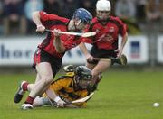 21 October 2006; Darren Nolan, Oulart-the-Ballagh, in action against Anthony O'Connell, Rathnure. Wexford Senior Hurling Championship Final Replay, Oulart-the-Ballagh v Rathnure, Wexford Park, Co. Wexford. Picture credit: Damien Eagers / SPORTSFILE