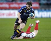 21 October 2006; Gordon D'Arcy, Leinster, goes past the tackle of Jack Adams, Gloucester, on the way to scoring his side's first try. Heineken Cup 2006-2007, Pool 2, Round 1, Leinster v Gloucester Rugby, Lansdowne Road, Dublin. Picture credit: Brian Lawless / SPORTSFILE