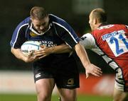 21 October 2006; Ronan McCormack, Leinster, is tackled by Ludovic Mezcier, Gloucester Rugby. Heineken Cup 2006-2007, Pool 2, Round 1, Leinster v Gloucester Rugby, Lansdowne Road, Dublin. Picture credit: Matt Browne / SPORTSFILE