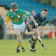 22 October 2006; Paul McGrath, Toomevara, in action against Kevin Tucker, Eire Og. Tipperary Senior Hurling Championship Final, Toomevara v Eire Og, Semple Stadium, Thurles. Picture credit: David Maher / SPORTSFILE