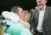 22 October 2006; Wolfe Tones captain Barry Loughnane is congratulated by his parents Mary and Ger Loughnane after the game. Clare Senior Hurling Championship Final, Wolfe Tones v Newmarket-on-Fergus, Cusack Park, Ennis, Co. Clare. Picture credit: Kieran Clancy / SPORTSFILE