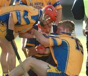 22 October 2006; Portumna's Joe Canning gets a helping hand from his brother Ollie after overcoming an injury against Loughrea. Galway Senior Hurling Championship Final, Portumna v Loughrea, Pearse Stadium, Galway. Picture credit: Ray Ryan / SPORTSFILE