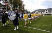22 October 2006; The Antrim team, led by captain Karl McKeegan, and the New York team march behind the Boston Police Gaelic Column Pipes & Drums Band during the pre-match parade. Guinness Ulster Senior Hurling Final, Irish Cultural Centre, Canton, Boston, USA. Picture credit: Brendan Moran / SPORTSFILE