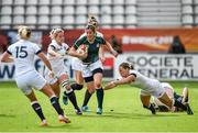 13 August 2014; Ireland's Alison Miller breaks the tackle of Katherine Merchant, England. 2014 Women's Rugby World Cup semi-final, Ireland v England, Stade Jean Bouin, Paris, France. Picture credit: Brendan Moran / SPORTSFILE