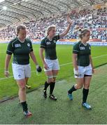 13 August 2014; Ireland players, from left, Laura Guest, Siobhan Fleming and Alison Miller leave the pitch after defeat to England. 2014 Women's Rugby World Cup semi-final, Ireland v England, Stade Jean Bouin, Paris, France. Picture credit: Brendan Moran / SPORTSFILE